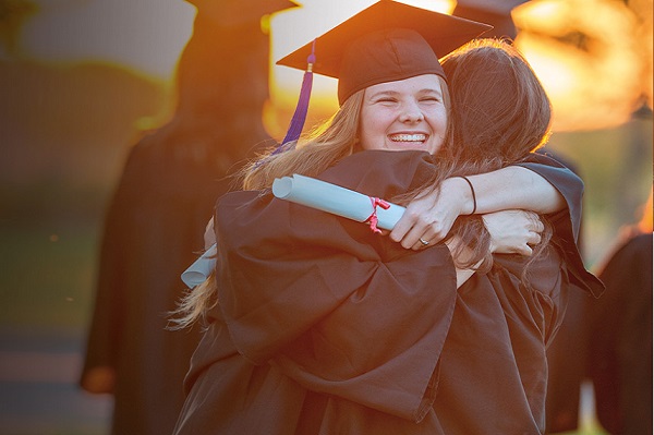candidates hugging returning