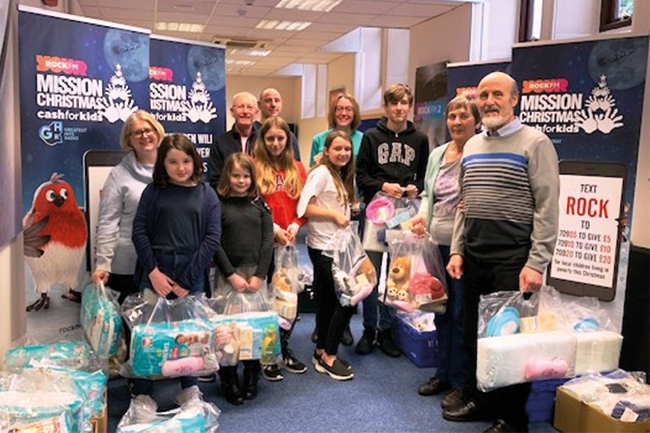 Foresters members assisting with Cash for Kids Mission Christmas 