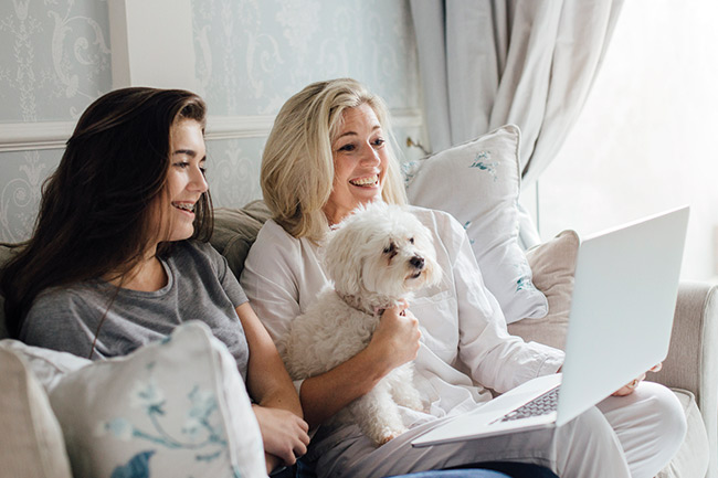 Mother and daughter setting up a My Plans account on their laptop to manage the Plan