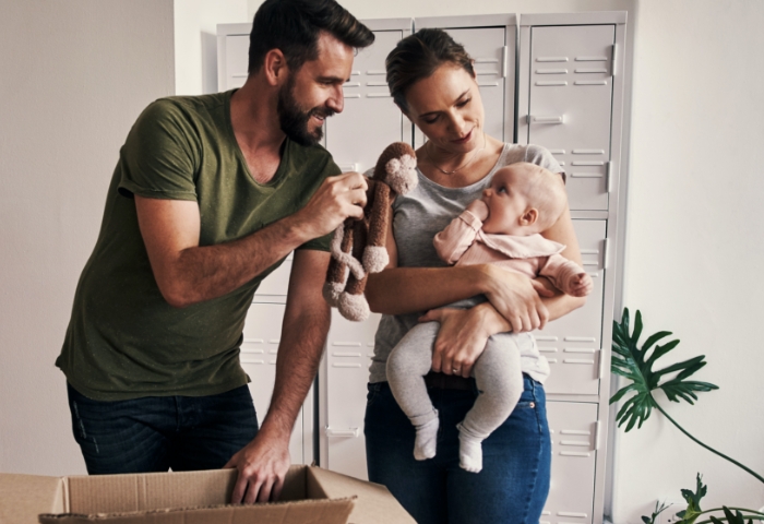 New couple playing with babay